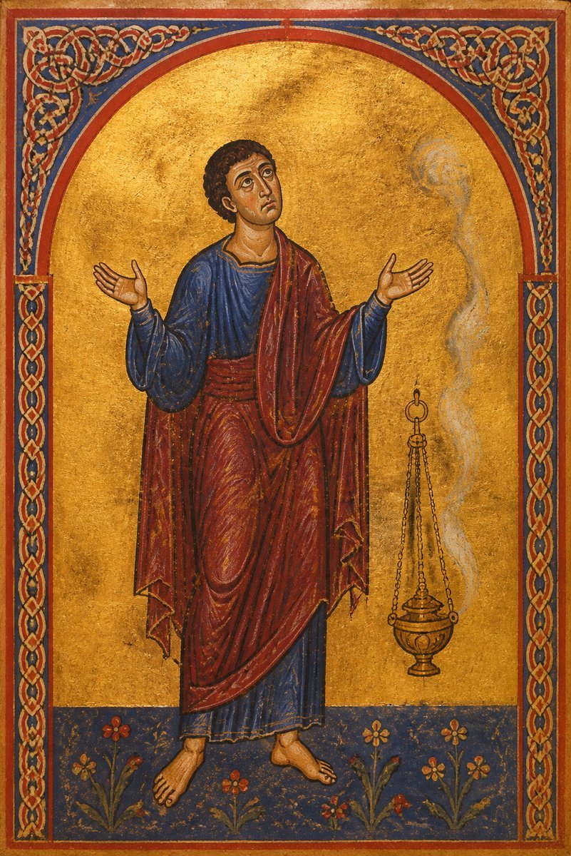 A worshiper in lapis and burgundy raises open hands in prayer beside a smoking censer