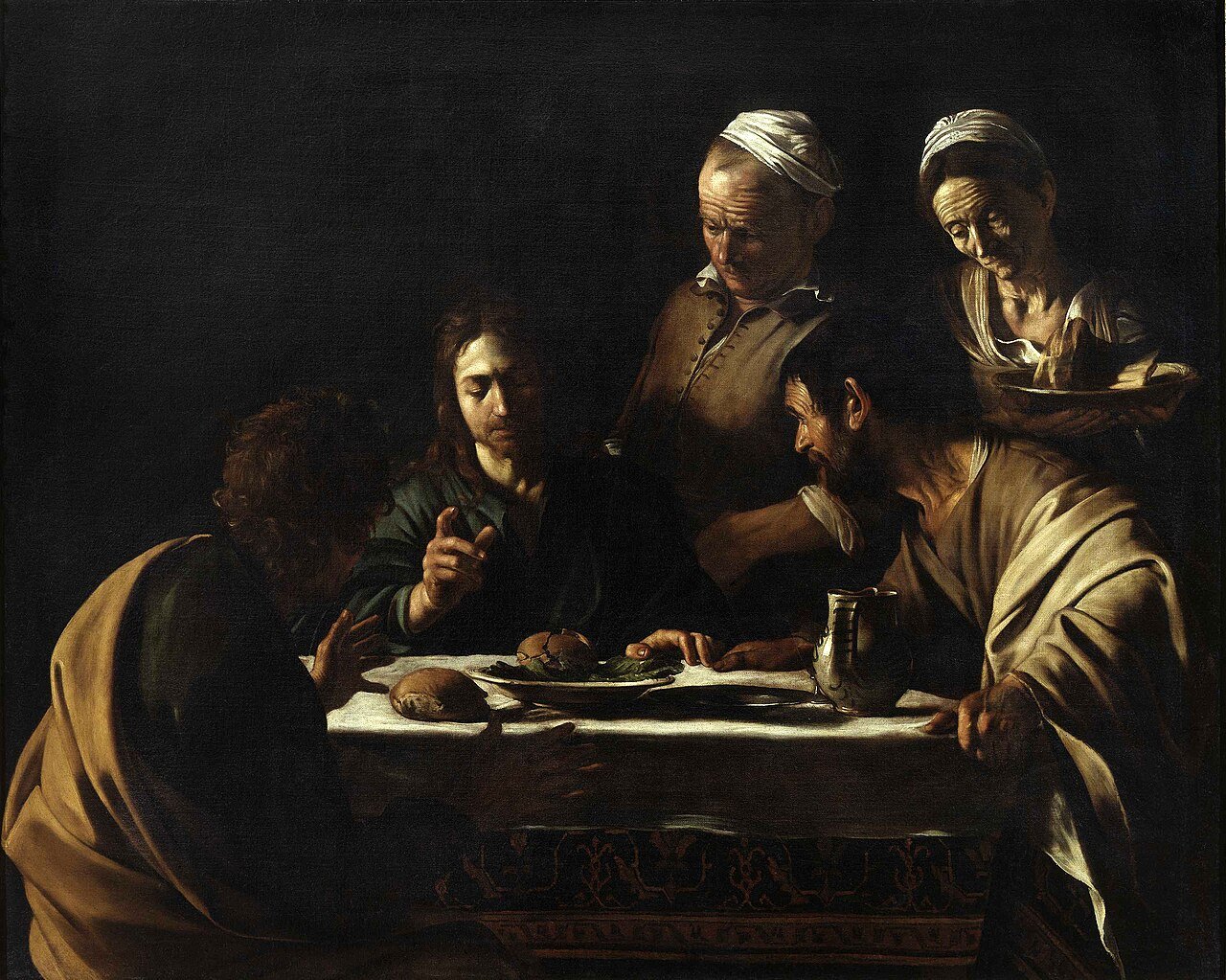 Jesus blessing bread at a dim table as two disciples lean in, on the edge of recognizing him — Caravaggio's Supper at Emmaus